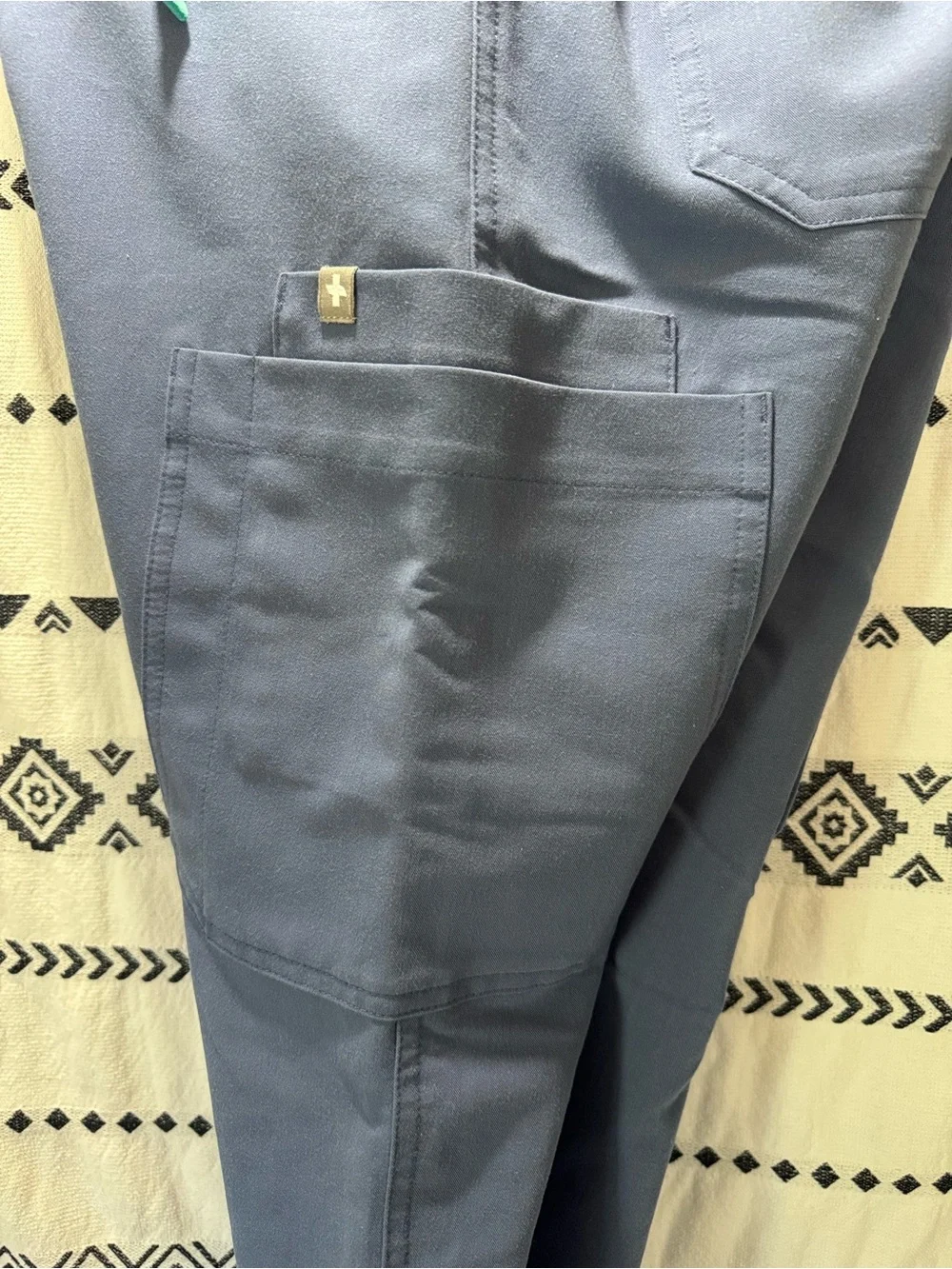 FIGS Yola High Rise Slim Scrub Pant in blue. women’s size Extra Small size XS